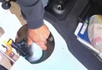 PF prende casal com 9 kg de drogas escondidos em tanque de combustível